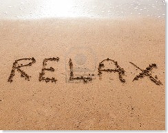 15446907-word-relax-in-handwriting-on-sandy-beach