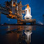 The space shuttle Atlantis is seen shortly after the rotating service structure (RSS) was rolled back at launch pad 39a, Thursday, July 7, 2011 at the NASA Kennedy Space Center in Cape Canaveral, Fla.  Atlantis is set to liftoff Friday, July 8, on the final flight of the shuttle program, STS-135, a 12-day mission to the International Space Station.  Photo Credit: (NASA/Bill Ingalls)