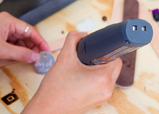 Dremel Micro Rotary Tool in Hand