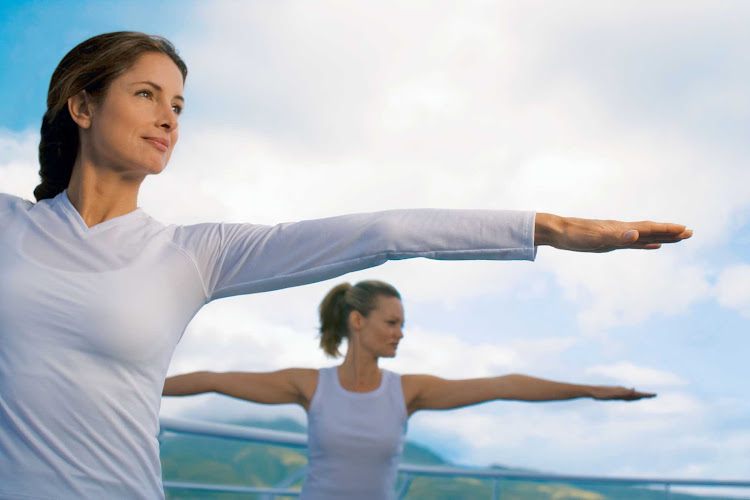 Start your morning with Canyon Ranch SpaClub's energizing yoga class during your cruise on Regent Seven Seas.