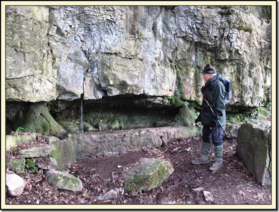 Allan inspects Silverdale's former water supply at Wood Well
