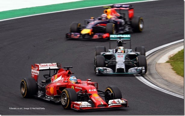 BUDAPEST, HUNGARY - JULY 27:  Fernando Alonso of Spain and Ferrari, Nico Rosberg of Germany and Mercedes GP and Daniel Ricciardo of Australia and Infiniti Red Bull Racing drive during the Hungarian Formula One Grand Prix at Hungaroring on July 27, 2014 in Budapest, Hungary.  (Photo by Lars Baron/Getty Images) *** Local Caption *** Fernando Alonso;Lewis Hamilton;Daniel Ricciardo