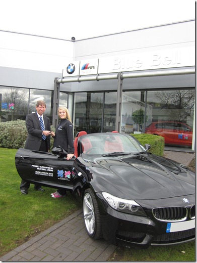 Fran Halsall receives her new BMW Z4 from Dealer Principal at Blue Bell Crewe, Barry Holt