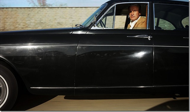 Man (possibly someone in character) traveling northwest at 60 mph on U.S. Route 101 in the vicinity of Hollywood on a late Sunday afternoon in March 1991 