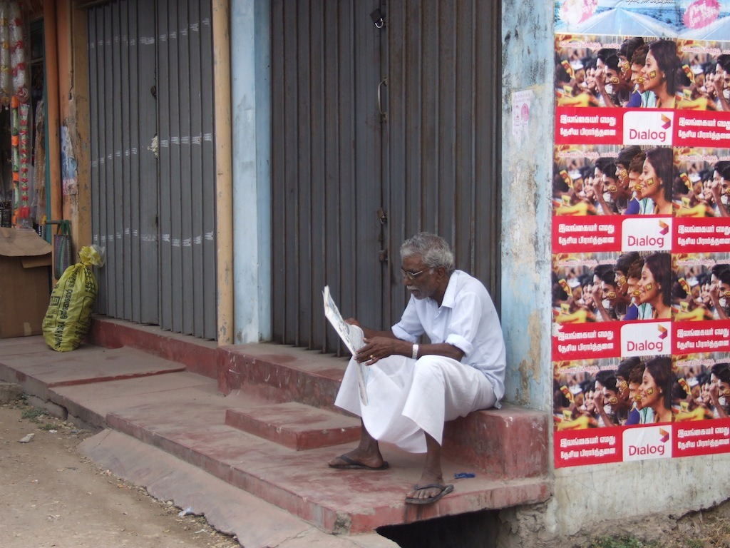 [An-elderly-person-eagerly-reads-the-Uthayan-Tamil-newspaper-in-the-morning%255B6%255D.jpg]