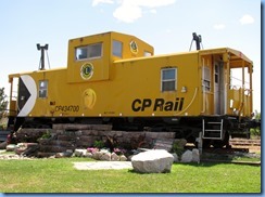 5956 Hwy 7 Havelock - yellow caboose at train tracks
