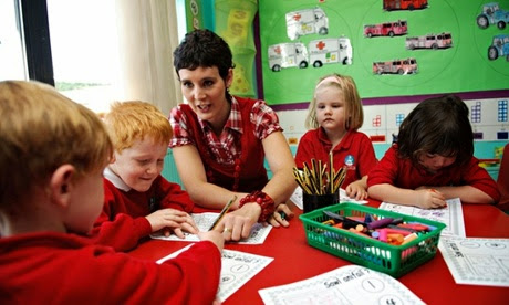 Young woman teacher in aprimary school