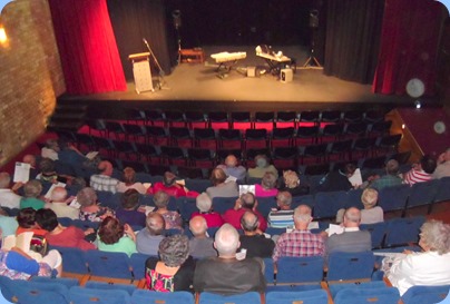 Part of the audience's view of the stage prior to the start of the Concert.