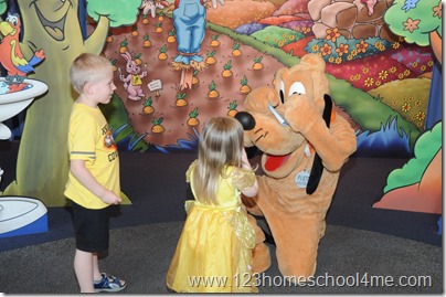 Pluto signing autograph at Disney Epcot Pluto signing autograph at Disney Epcot
