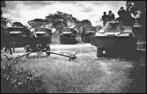 SADF operations in Namibia and Angola OPERATION ASKARI CAPTURED RUSSIAN 76MM Z183 ARTILLERY CANON AND URAL TRUCKS IN FRONT A SADF RATEL ARMOURED CAR