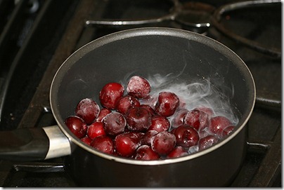 4 cooking down the frozen cherries