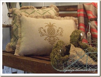 porch swing, burlap eco pillows, and mossy mushrooms