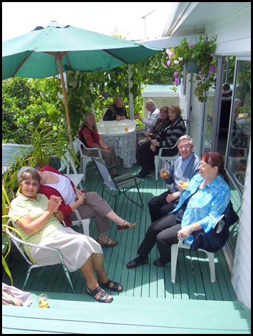 Some of our members enjoying a glass of punch and soaking up the sunshine on Delyse's deck.