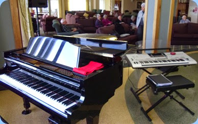 The Knightsbridge Kawai grand piano and some of our Club members and residents relaxing to the music.