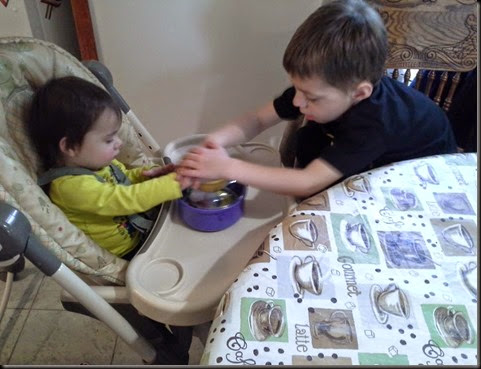 Aidan and Miranda coloring eggs 2