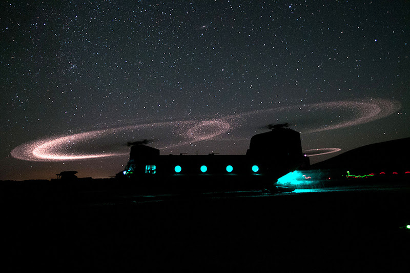 Dust lights up the rotors of a CH-47 Chinook helicopter as paratroopers with 3rd Squadron, 73rd Cavalry Regiment load for an air assault mission near Combat Outpost Ab Band, May 23, 2012, Ghazni province, Afghanistan.  The unit is part of the 82nd Airborne Division’s 1st Brigade Combat Team, which deployed to the area in March to help bring security to the areas along the country’s main road between Kabul and Kandahar.
