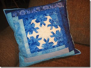 Snowflake log cabin style pillow