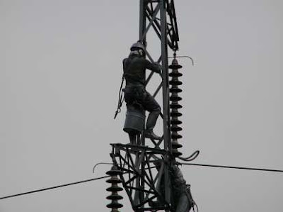Working on a power transmission line