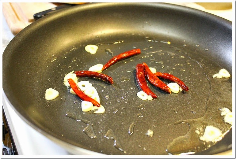 roasting arbol peppers and garlic 