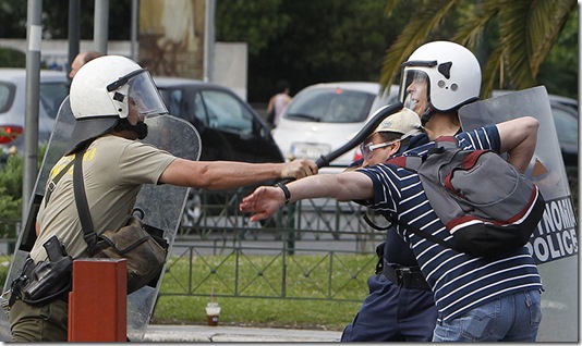 A-riot-policeman-strikes--004