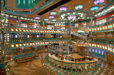 The Magic Bar, on deck 3 of Carnival Magic's atrium, is a perfect spot to meet friends for cocktails and people watching. 