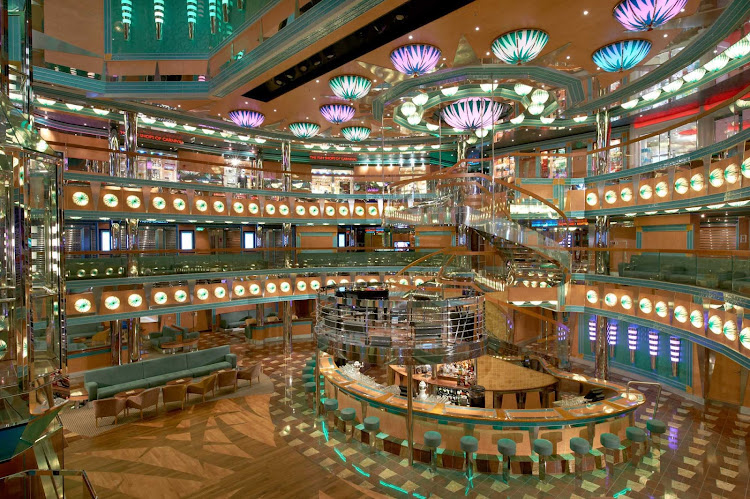 The Magic Bar, on deck 3 of Carnival Magic's atrium, is a perfect spot to meet friends for cocktails and people watching. 