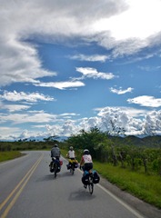 New friends riding towards El Bordo, Colombia under an unreal sky.