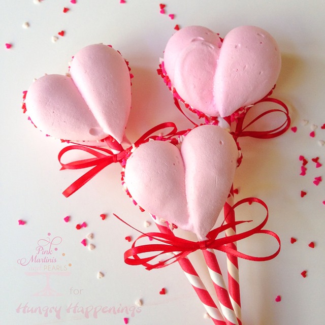 Chocolate might reign supreme as the sweet choice for Valentine's Day but if something lighter tickles your fancy, then these Meringue Heart Cookie Pops just might make your heart go all aflutter.
