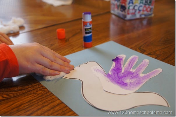 glue the hand on the dove glue the hand on the dove
