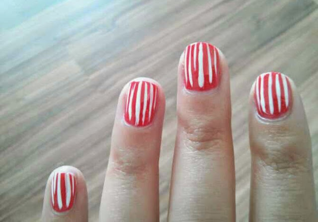 summer mani nail design coral with white stripes