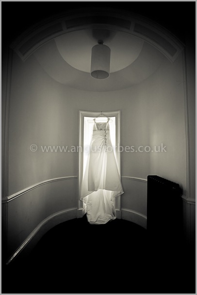 Brides dress at window, carberry tower, edinburgh