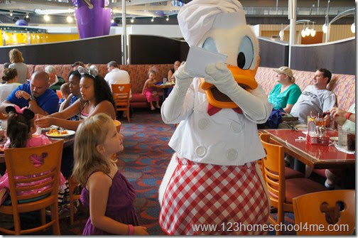Getting an autograph from Donald Duck at Chef Mickey's at Disney World Getting an autograph from Donald Duck at Chef Mickey's at Disney World