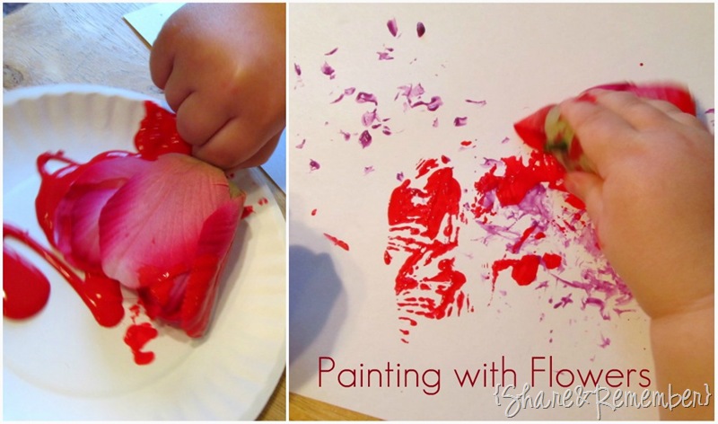 Painting with flowers preschool art