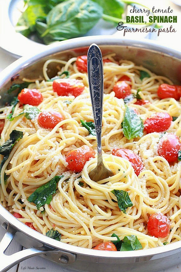 pasta salad with spinach and cherry tomatoes
