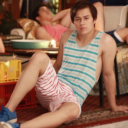enrique gil and a guy behind him
