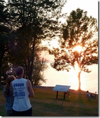 Amanda and Brandon enjoying a sunset over Lake Ontario
