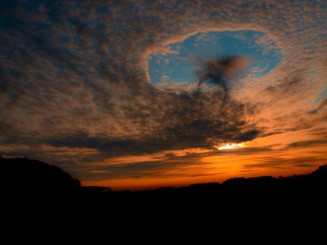 punch-hole-clouds-2