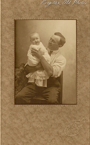 Man with baby Solway Antiques