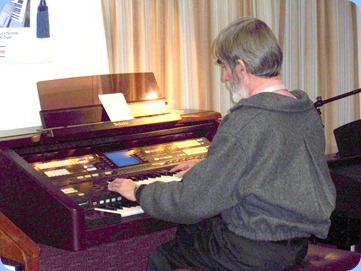 Richard playing the Club's Technics GA3 organ