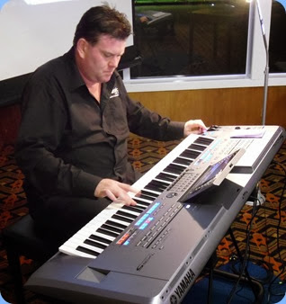 Our guest artist, Chris Larking, playing (superbly) the very latest Yamaha Tyros 5 (76 note version) keyboard. Photo courtesy of Gordon Sutherland