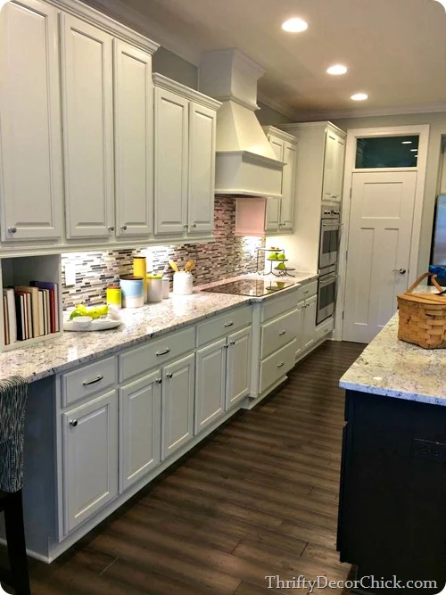 white kitchen brown modern backsplash