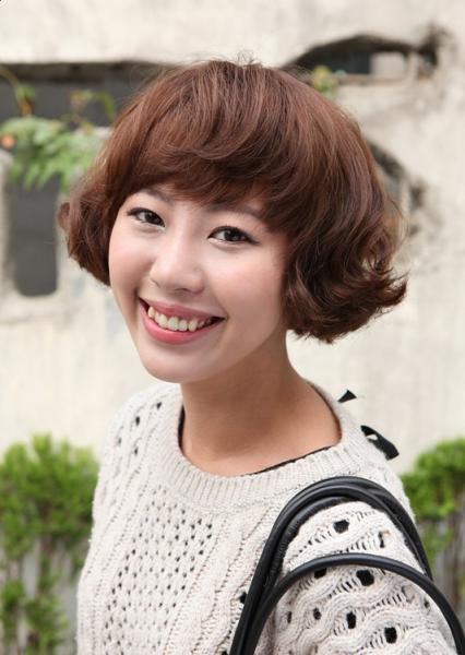 A cute Korean girl with sleek short bob haircut
