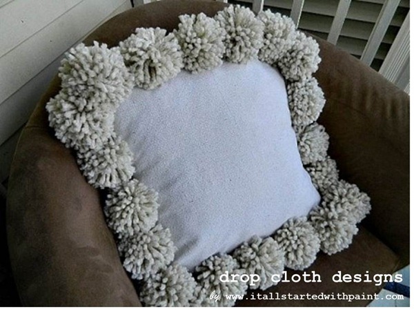 Pom Pillow in Chair with watermark