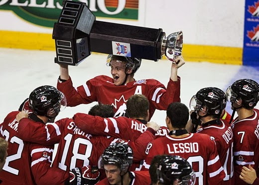 [Dougie-Hamilton-raises-the-Canada-Russia-Challenge-trophy-in-August-The-Canadian-Press%255B3%255D.jpg]