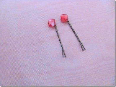 two pink beads