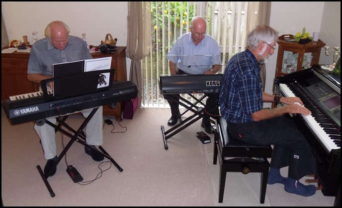 L to R: Rob Powell, Peter Brophy and Errol Storey having a jam session.