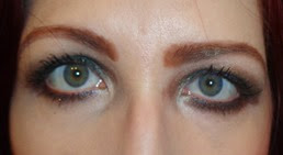 eyes with Laura Mercier Tempting Green eye shadow and Envy Creme Eyeliner_open
