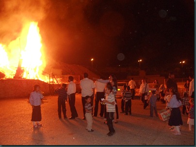 Lag Ba'Omer the children enjoy the bonfirel from a safe distance