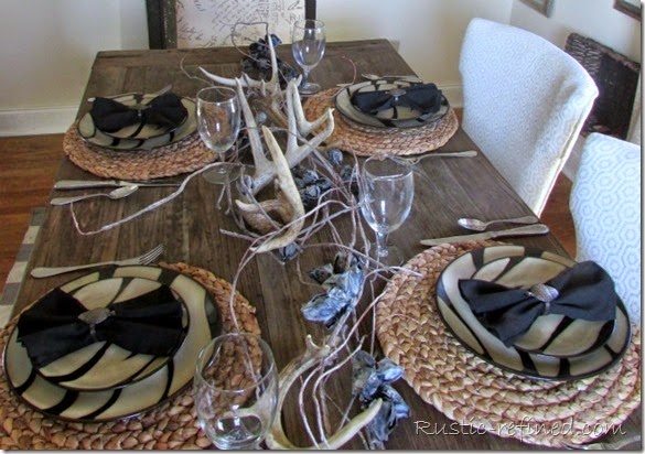 Rustic and refined tablescape using antlers for a woodland setting