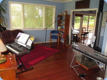 Starting to set-up our hosts' lovely lounge for the musical instrument invasion.